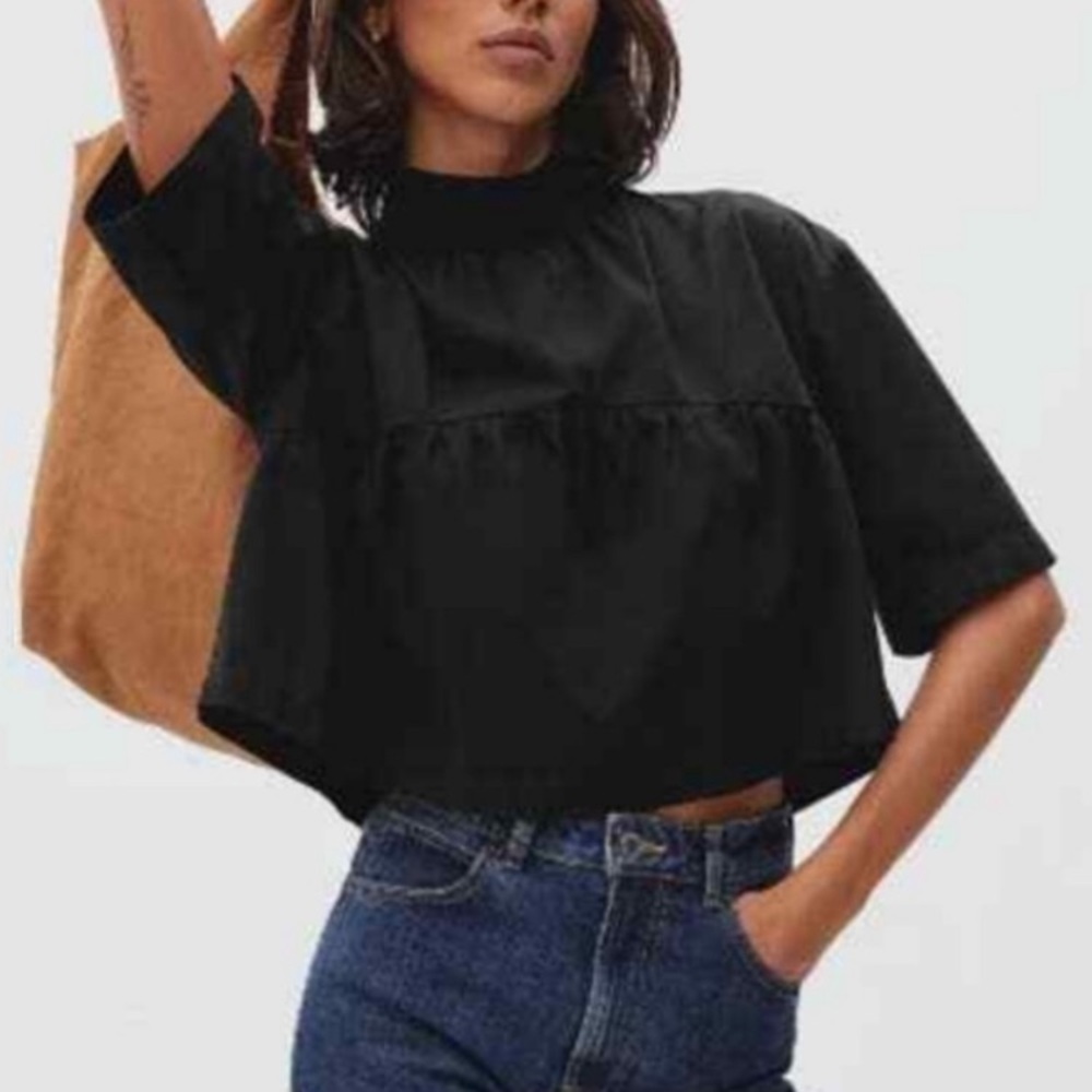 Everlane black blouse. Too small for me now, but so cute.